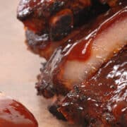 Kansas City Barbecue Sauce dripping over tender bbq ribs