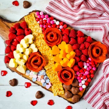 charcuterie board with meat roses and Valentine's Day candies